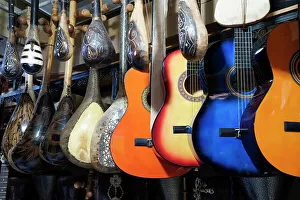 Hanging Prints: Fes, Morocco. Traditional musical instruments for sale at a music shop in the medina