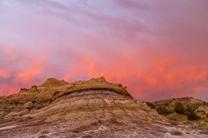 Medora Prints: Fiery sunrise clouds over badlands at dawn in Theodore Roosevelt National Park