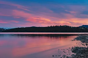 Fiery sunset clouds over Flathead Lake in Dayton, Montana, USA