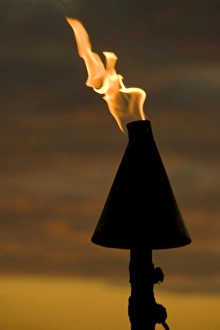 Tiki Prints: Fiji, Viti Levu, Lautoka. Tiki torch against evening sky