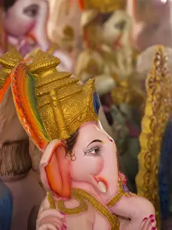 South Asia Prints: A finished Ganesha statue waits to be sold for the Ganesha Chaturthi festivities in Bangalore