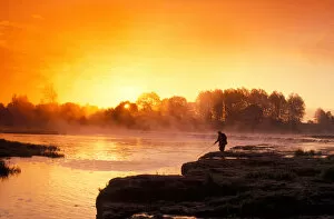 Images Dated 7th March 2006: Fisherman at sunrise on Venta River waterfall at city of Kuldiga in Kurzeme region