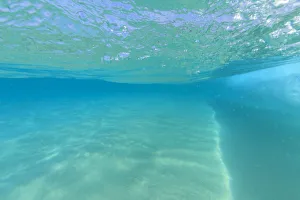 Fisheye view of wave breaks at Kua Beach, North of Kona, Big Island, Hawaii