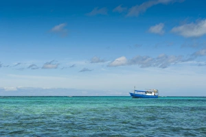 Scenics Prints: Fishing boat in the turquoise waters of the blue lagoon, Yasawas, Fiji, South Pacific