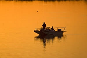 Fishing at sunset in north Texas, winter on Lake Arrowhead, USA