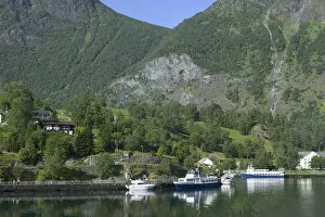 Flam; situated in the innermost part of the Sognefjord surrounded by high mountains