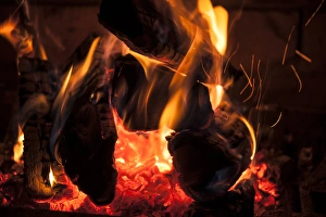 Burning Prints: Flames licking wood