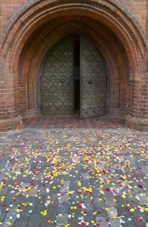 Images Dated 20th June 2007: Flower petals fallen on the street outside gate of St. Annes Church, Vilnius