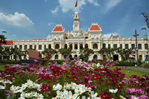 Flowers and historic Peoples Committee Building (former Hotel de Ville de Saigon)