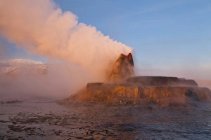 Images Dated 16th February 2012: Fly Geyser with snow capped Granite Range in the Black Rock Desert near Gerlach, Nevada