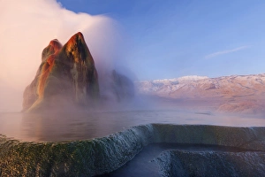 Images Dated 16th February 2012: Fly Geyser with snow capped Granite Range in the Black Rock Desert near Gerlach, Nevada