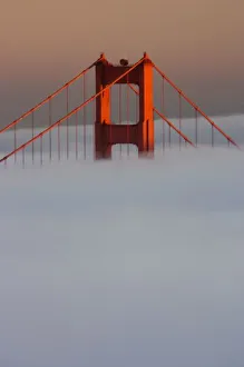 Images Dated 13th November 2007: Fog rolls through the San Francisco bay covering the Golden Gate Bridge. Pictured