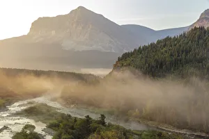 Images Dated 24th August 2018: Fog at sunrise along Swiftcurrent Creek in Glacier National Park, Montana, USA