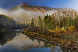 Foggy Prints: Foggy autumn sunrise light on McDonald Creek and Apgar Mountain in Glacier National Park