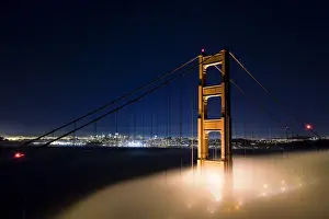 Cable Prints: A foggy view of the Golden Gate Bridge and San Francisco with a clear sky above