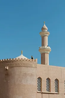 View From Below Prints: The fort of Nizwa. A scenic view of the fort at Nizwa, and its minaret. Nizwa, Oman