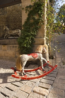 Images Dated 28th October 2010: France, Aquitaine Region, Dordogne Department, Sarlat-la-Caneda, antique hobby-horse