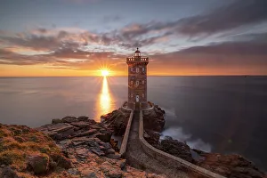 Lookout Prints: France, Brittany, Le Conquet. Sun setting at the Kermorvan Lighthouse