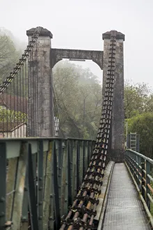 Cable Prints: France, Cajarc. Early morning fog on the iron bridge over the Lot River