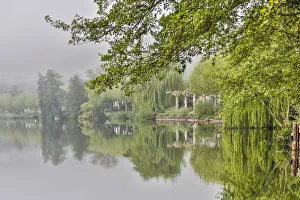 France, Cajarc. Early morning fog on the Lot River