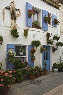 Images Dated 14th July 2007: France, Camargue, Saintes-Maries-de-la-Mer. Colorful homes line the quaint streets