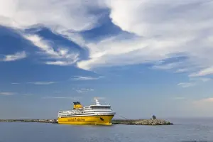 Bastia Prints: France, Corsica. Ferry below cirrus clouds at New Port in Bastia