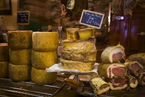 Images Dated 16th June 2008: France, Corsica. Local cheeses and charcuterie (cured meats) at shop in Calvi offering