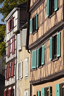 Images Dated 12th October 2010: France, Haut-Rhin, Alsace Region, Alsatian Wine Route, Thann, buildings along Thur River