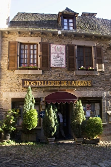 Judith Haden Prints: FRANCE, Midi-Pyrenees, Department of Aeyron, Rodez. Romanesque-styled hotel in Conques