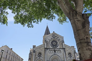 Saint Prints: France, Nimes, Saint Paul church. Gothic church with one spire and rose window