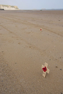 Remembrance Prints: France, Normandy, Arromanches Beach. Remembrance crosses placed in the sand on
