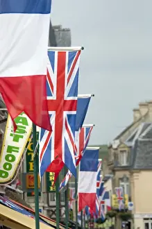 Images Dated 6th June 2010: France, Normandy, Arromanches. Ceremonial flags line the streets of Normandy for