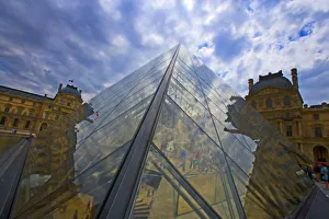 Images Dated 26th June 2006: France, Paris. Clouds reflect off the Louvre Museum. Credit as: Jim Zuckerman / Jaynes