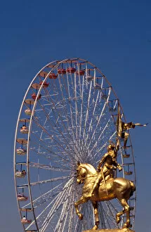 France, Paris, Jeanne d Arc statue and wheel. Rue de Rivoli