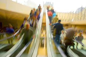 Escalator Prints: France, Paris. The Louvre. Escalator and tourists in the modern glass pyramid. Credit as