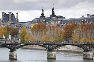 Ile De France Prints: France, Paris, Musee de Louvre museum and Pont des Arts bridge