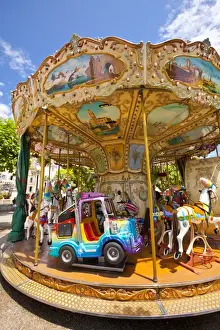 Images Dated 9th June 2009: France, Provence, Cannes. Colorful and ornate outdoor carousel. Credit as: Fred Lord