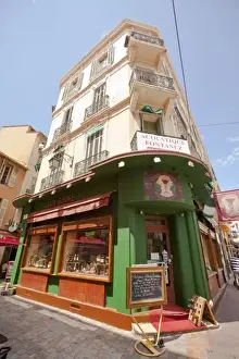 Corner Prints: France, Provence, Cannes. Corner building with shop on first floor. Credit as: Fred