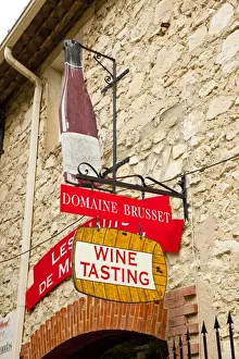 Fred J Lord Prints: France, Provence, Gigondas. Sign for wine-tasting shop. Credit as: Fred Lord / Jaynes