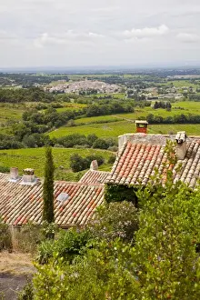 Fred J Lord Prints: France, Provence, Seguret. View of countryside above tiled rooftops. Credit as: Fred