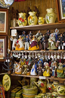 Images Dated 7th June 2009: France, Provence, St. Remy-de-Provence. Dolls and other wares displayed inside shop
