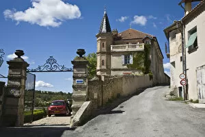 France, Provence, Valensole. Village road passes by Chateau du Grand Jardin