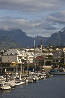France, Reunion Island, St-Pierre, Harborfront with Cirque de Cilaos mountains in the background