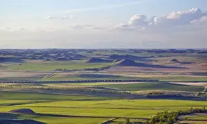 Freight train full of coal heads through the plains at Sentinel Butte North Dakota