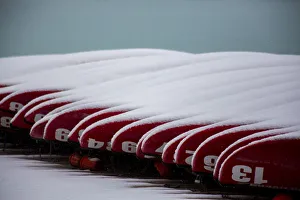 Lake Louise Prints: Fresh late summer snow on docked canoes Lake Louise, Banff National Park, Alberta, Canada