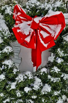 Snowing Prints: Fresh snow on the Christmas wreath, town of Snoqualmie