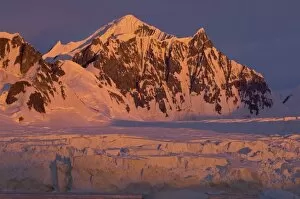 Images Dated 8th February 2007: frozen glacial mountain landscape along the western Antarctic peninsula at sunset