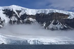South Pole Prints: frozen glacial mountain landscape along the western Antarctic peninsula, Antarctica