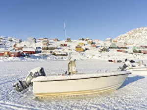 Greenland Prints: The frozen harbor. The traditional and remote Greenlandic Inuit village Kullorsuaq