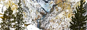 Frozen Waterfall seen from Artist Point view in Winter Snow. Yellowstone National Park